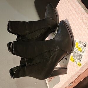 Like New: First Love booties. Women's size 8 Medium. Black leather.